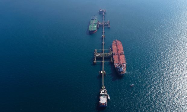 An aerial photo shows oil tankers load crude oil at Iraq's Al-Basra Offshore Terminal in Basra, Ira...
