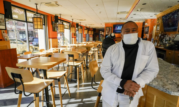 Andrew Walcott, owners of Fusion East Caribbean & Soul Food restaurant, poses for a photo at th...