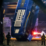 APTOPIX Bus Crash Overpass