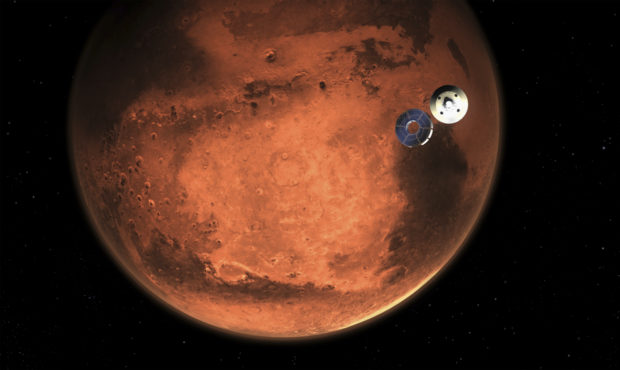 In this illustration made available by NASA, the Perseverance rover casts off its spacecraft's crui...