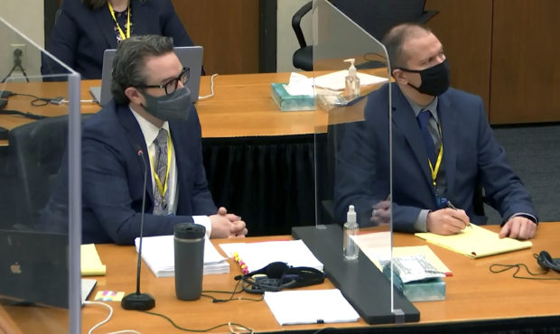 In this image taken from video, defense attorney Eric Nelson, left, and defendant, former Minneapol...