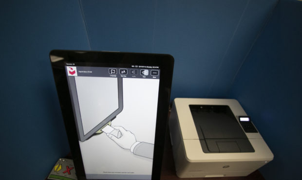 FILE- In this Sept. 16, 2019, file photo, a Dominion Voting Systems voting machine is seen in Atlan...