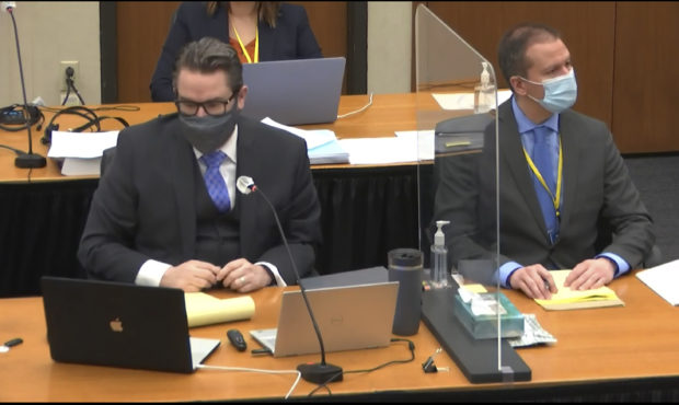 In this image from video, defense attorney Eric Nelson, left, defendant, former Minneapolis police ...
