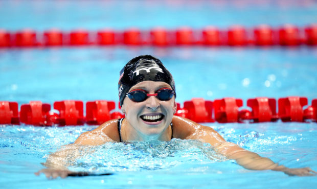Kathleen Ledecky, of the United States, leaves the pool after winning the women's 800-meter freesty...