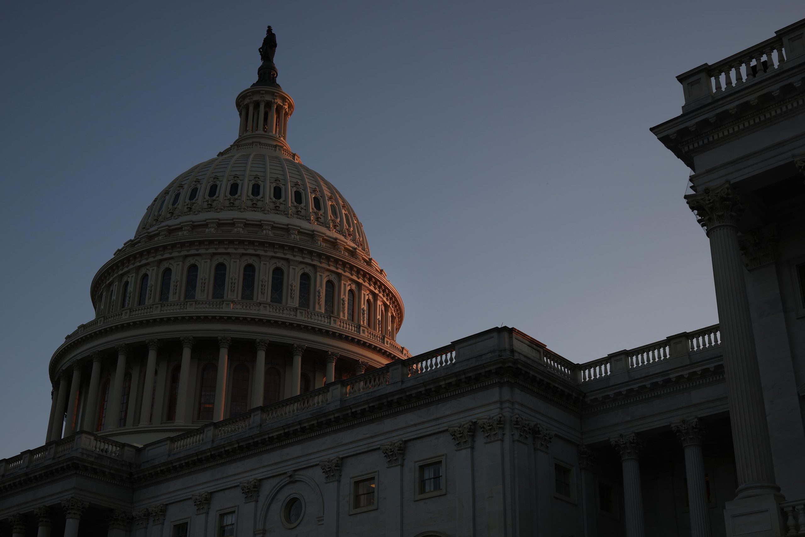 FILE: The U.S. Capitol Dome is illuminated by the sunset on August 2, in Washington, DC (Photo by A...