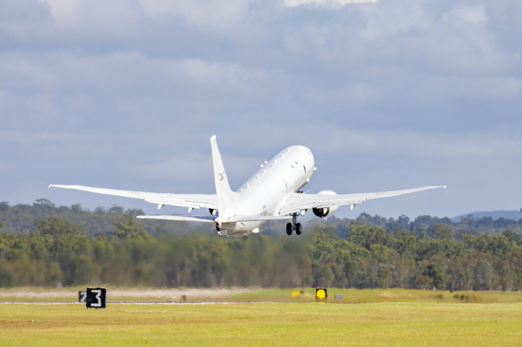 In this photo provided by the Australian Defense Force a Royal Australian Air Force P-8 Poseidon ai...