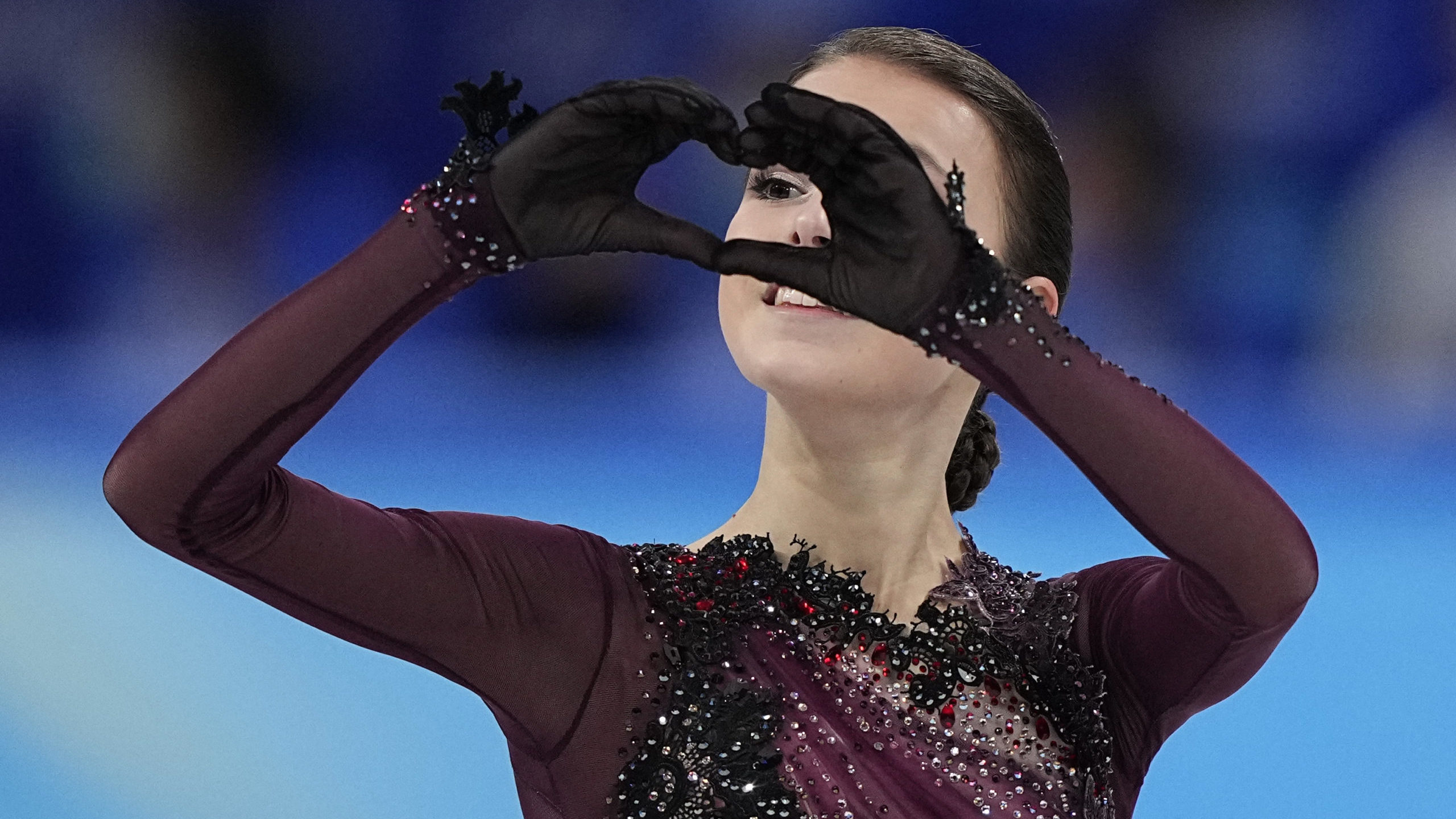 Anna Shcherbakova, of the Russian Olympic Committee, gestures after competing in the women's free s...