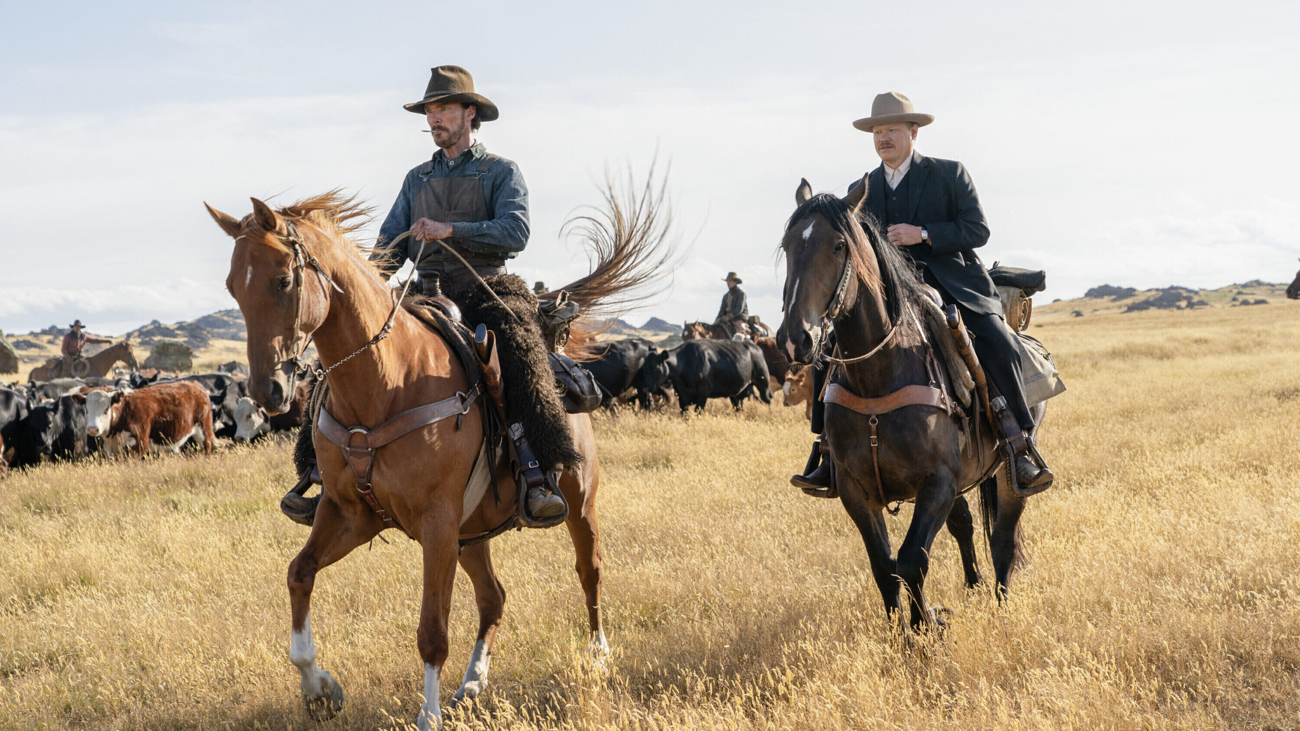 This image released by Netflix shows Benedict Cumberbatch, left, and Jesse Plemons in a scene from ...