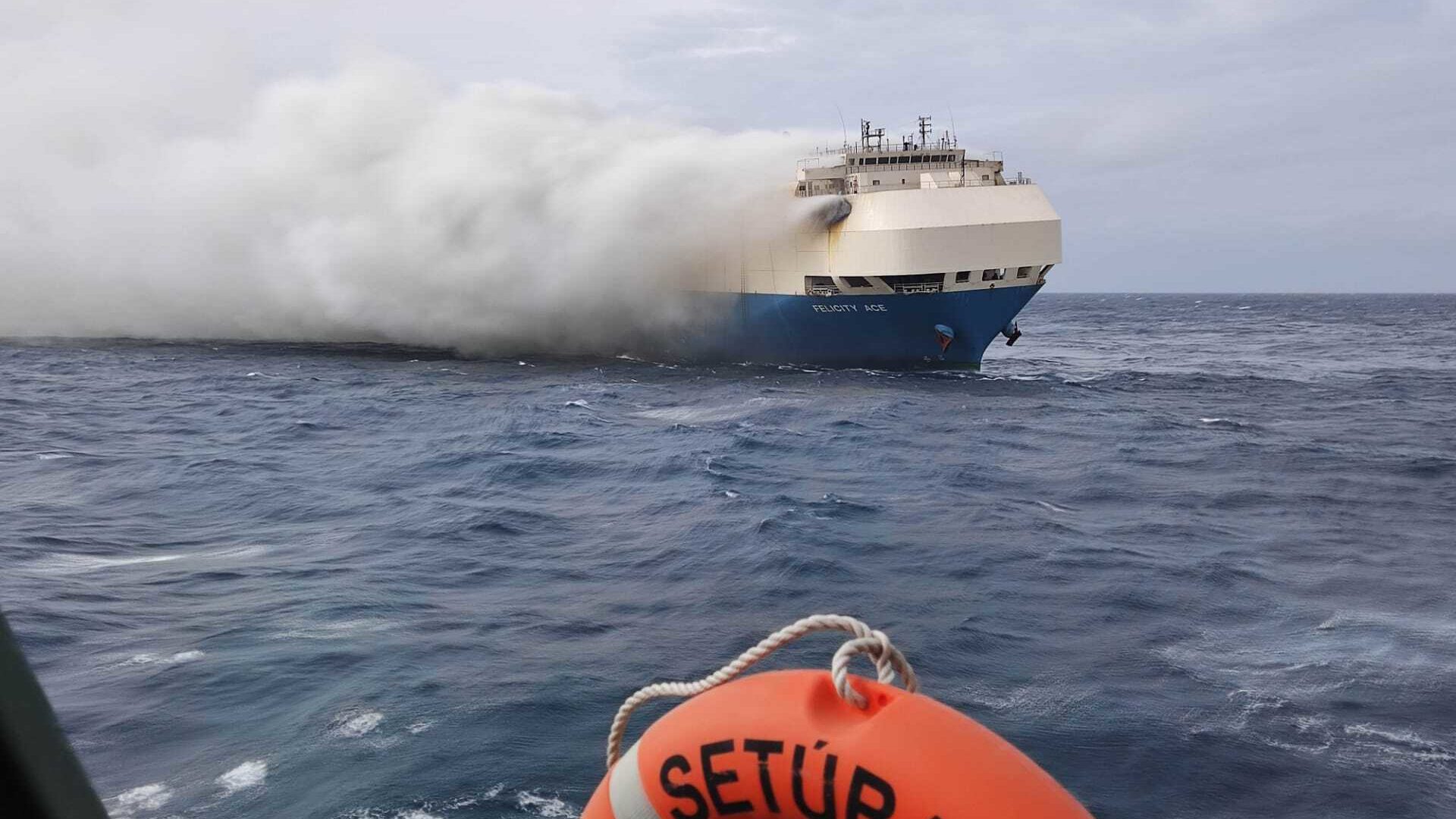 In this undated photo provided by the Portuguese Navy, smoke billows from the burning Felicity Ace ...