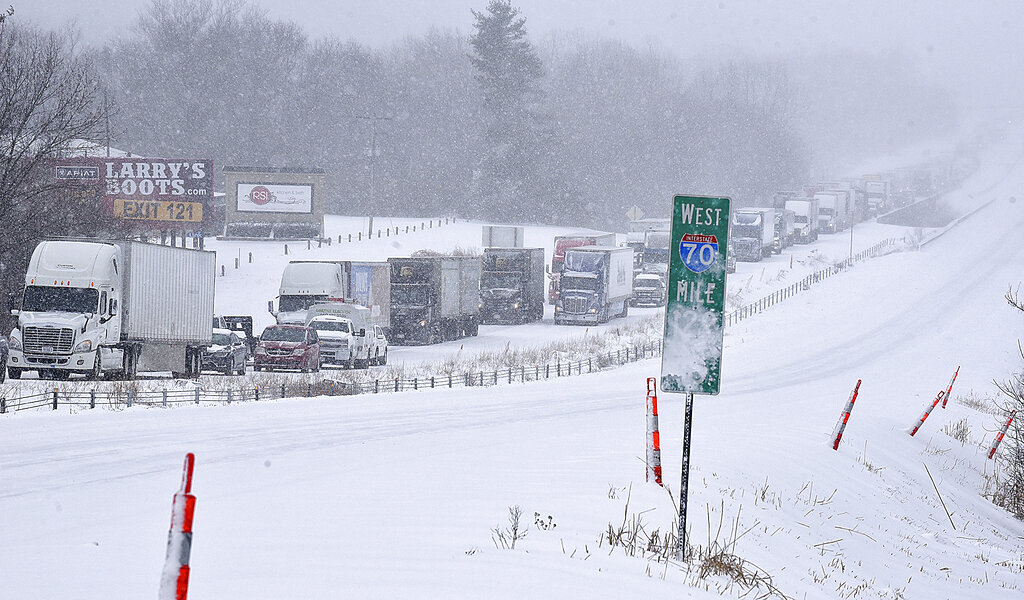 Traffic along eastbound Interstate 70 near Stadium Blvd. is halted on Wednesday Feb. 2, 2022, in Co...