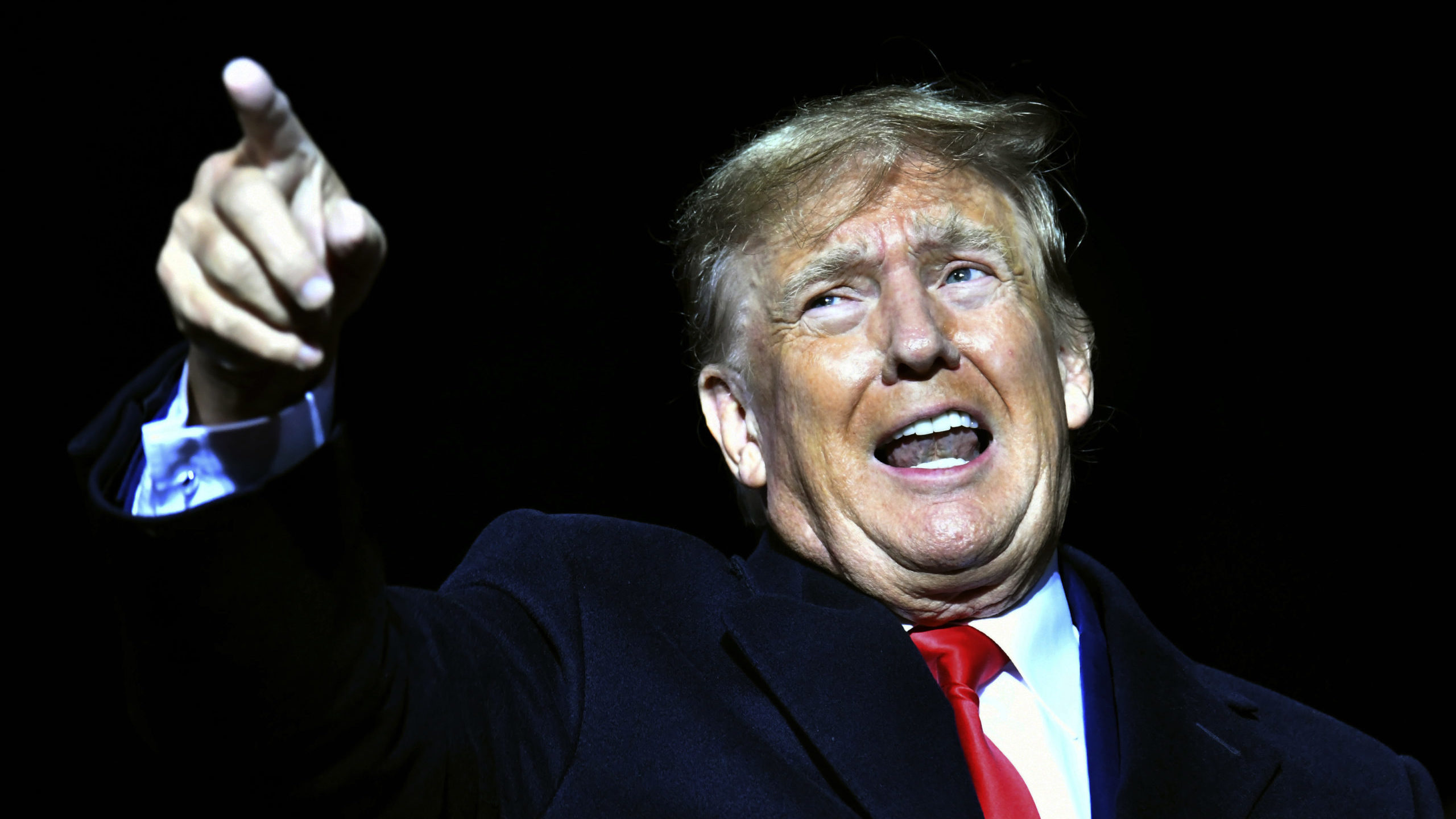 FILE - Former President Donald Trump speaks during a rally for Georgia GOP candidates at Banks Coun...
