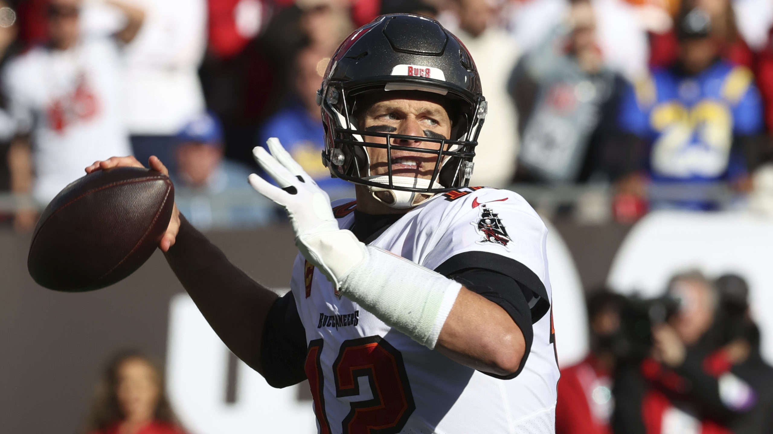FILE - Tampa Bay Buccaneers quarterback Tom Brady (12) throws a pass against the Los Angeles Rams d...