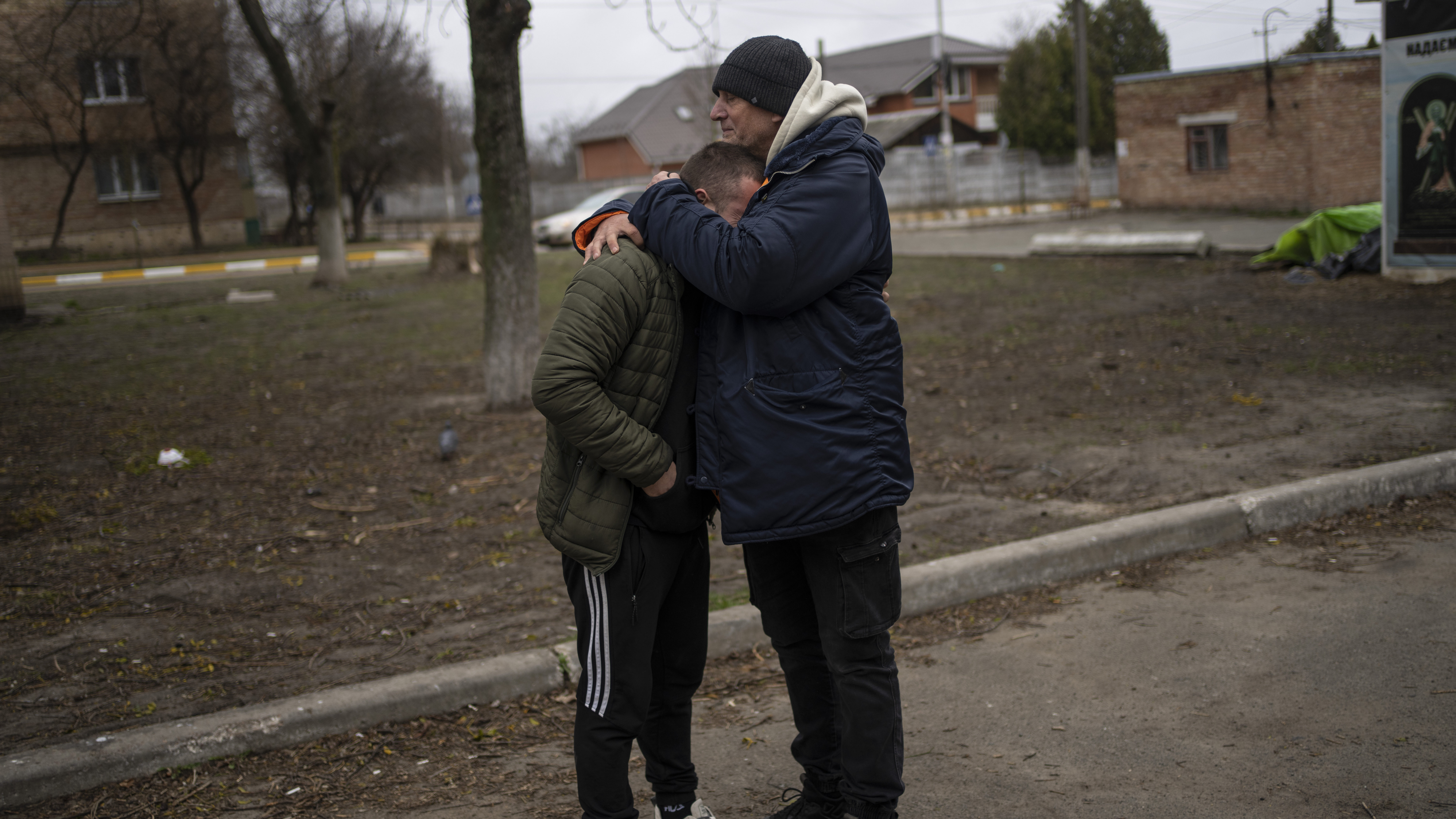 The father and a friend of Anatoliy Kolesnikov, 30, who was killed by Russian soldiers in his car t...