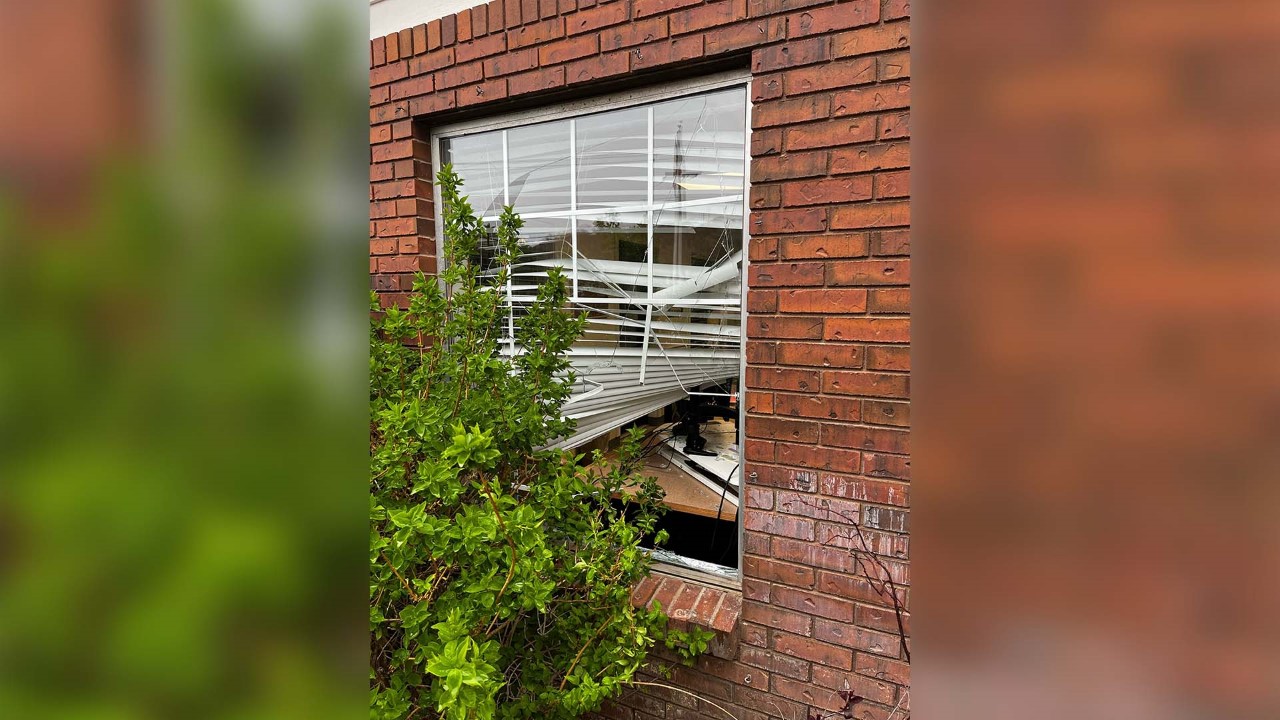 City hall break-in window was smashed...