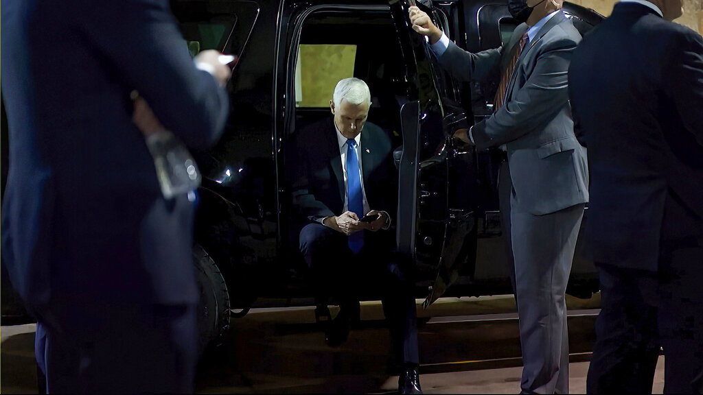 In this image from video released by the House Select Committee, Vice President Mike Pence looks at...