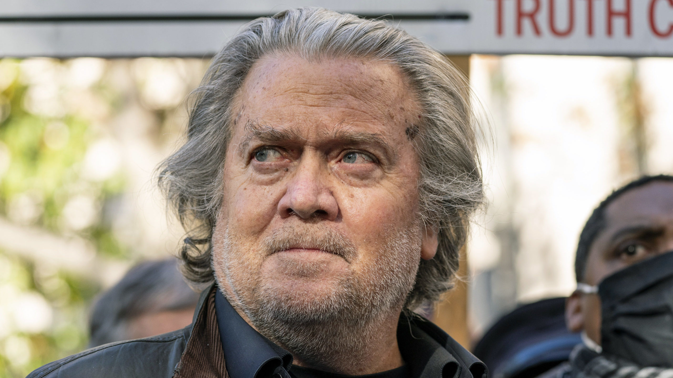 Former White House strategist Steve Bannon speaks with reporters after departing federal court on N...