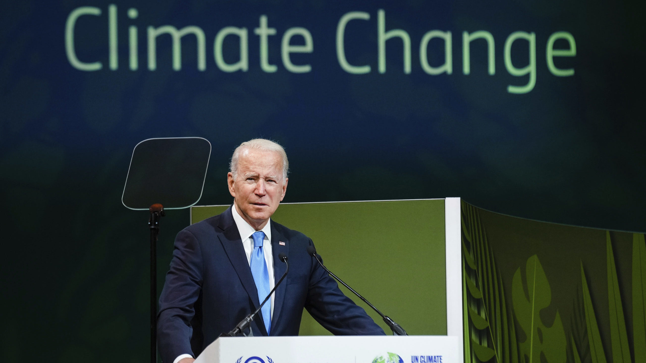 President Biden stands at podium....