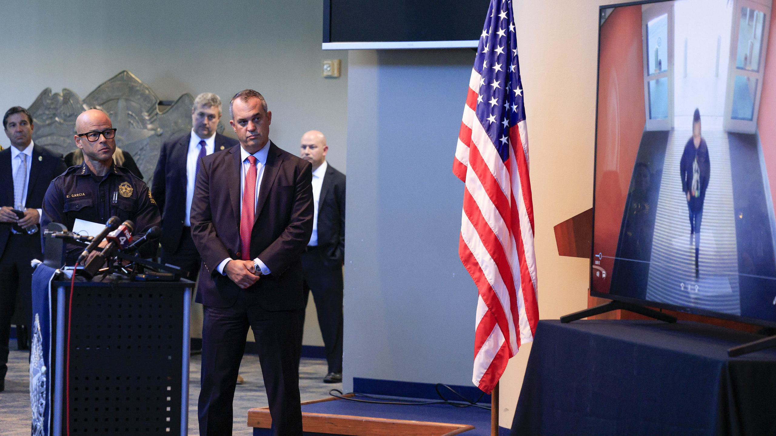Dallas police Chief Eddie García, left, and FBI Dallas Special Agent in Charge Matthew DeSarno wat...
