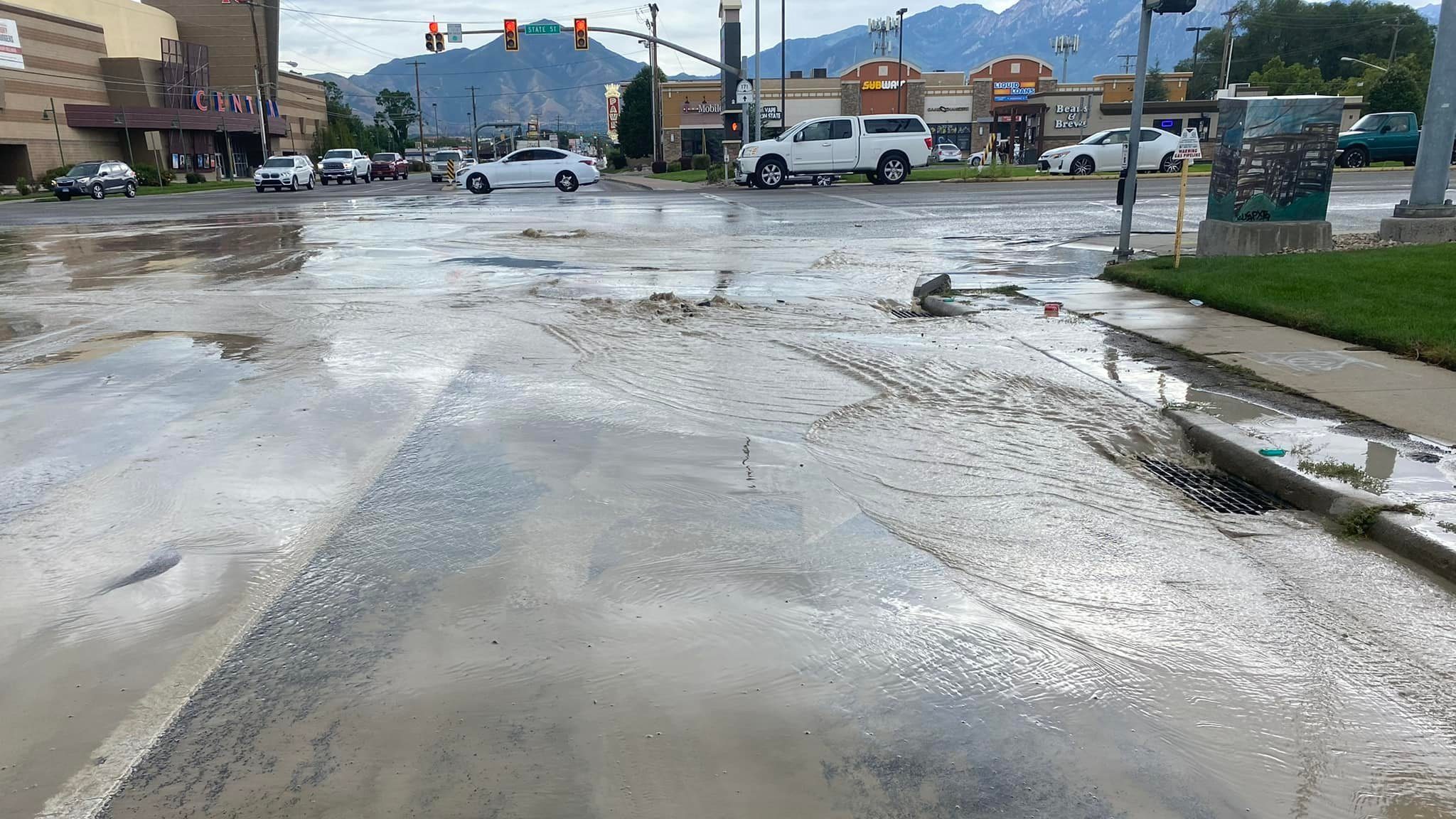 The flooded roadway on 3300 south is pictured...