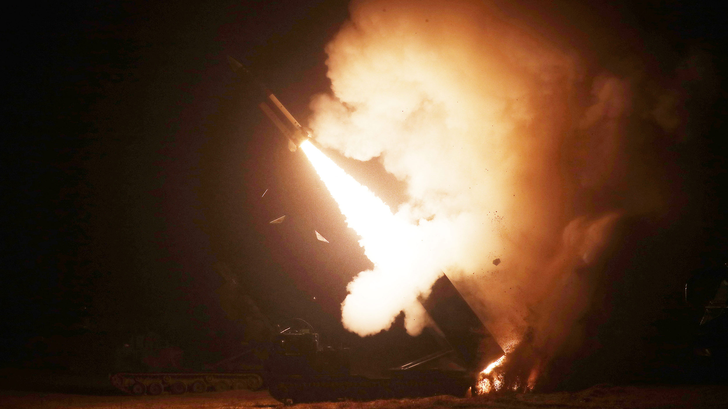 A surface-to-surface missile is fired into the sea off the east coast in this handout picture provi...