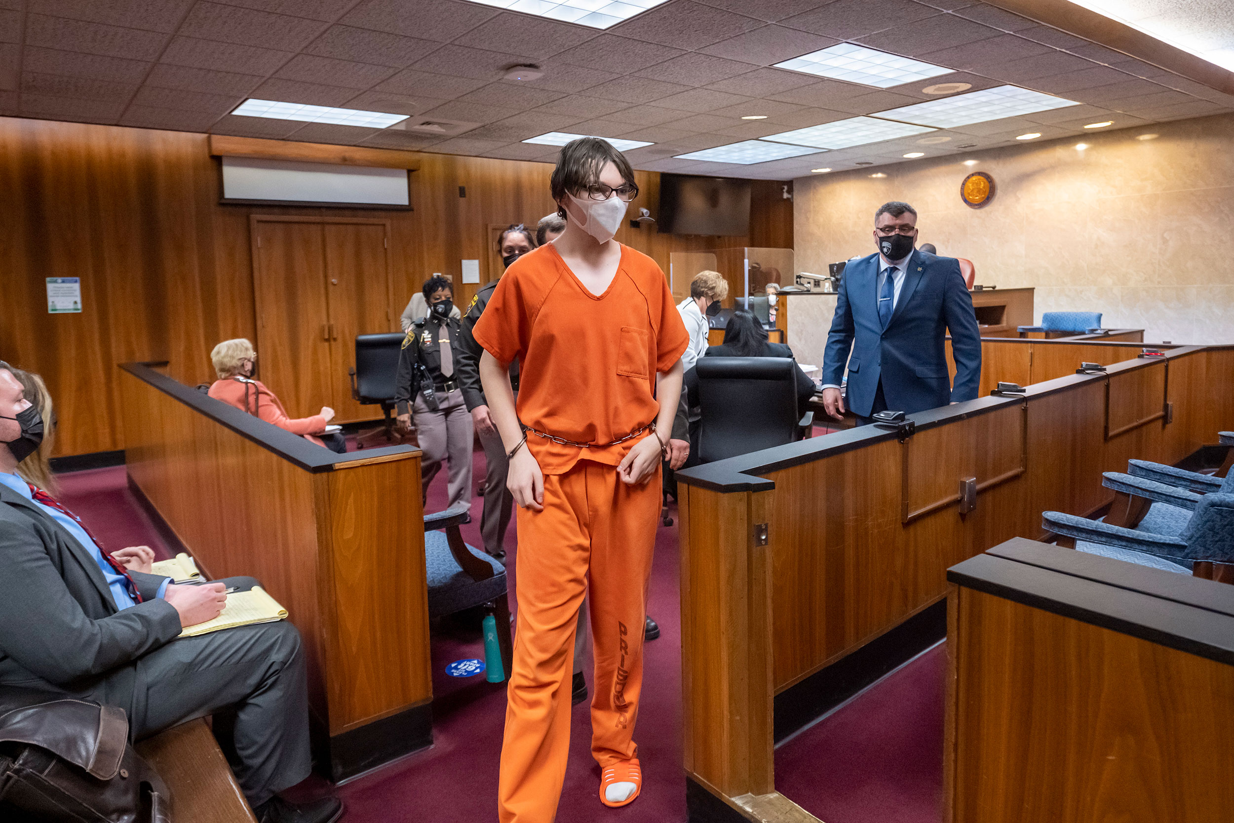 Ethan Crumbley is led away from the courtroom after a placement hearing at Oakland County circuit c...