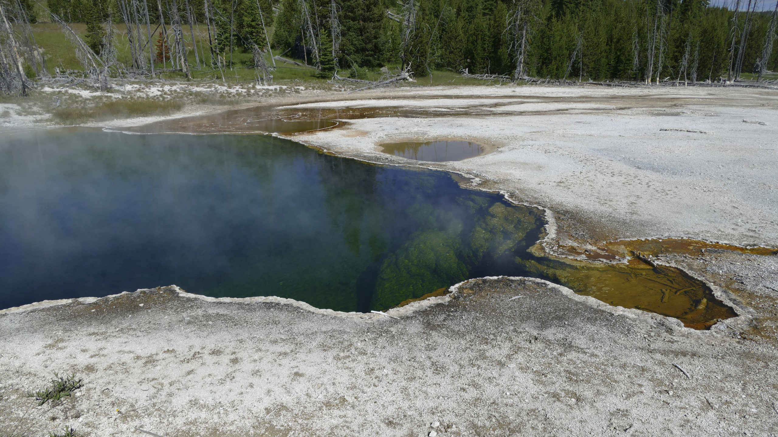 FILE - In this photo provided by the National Park Service is the Abyss Pool hot spring in the sout...