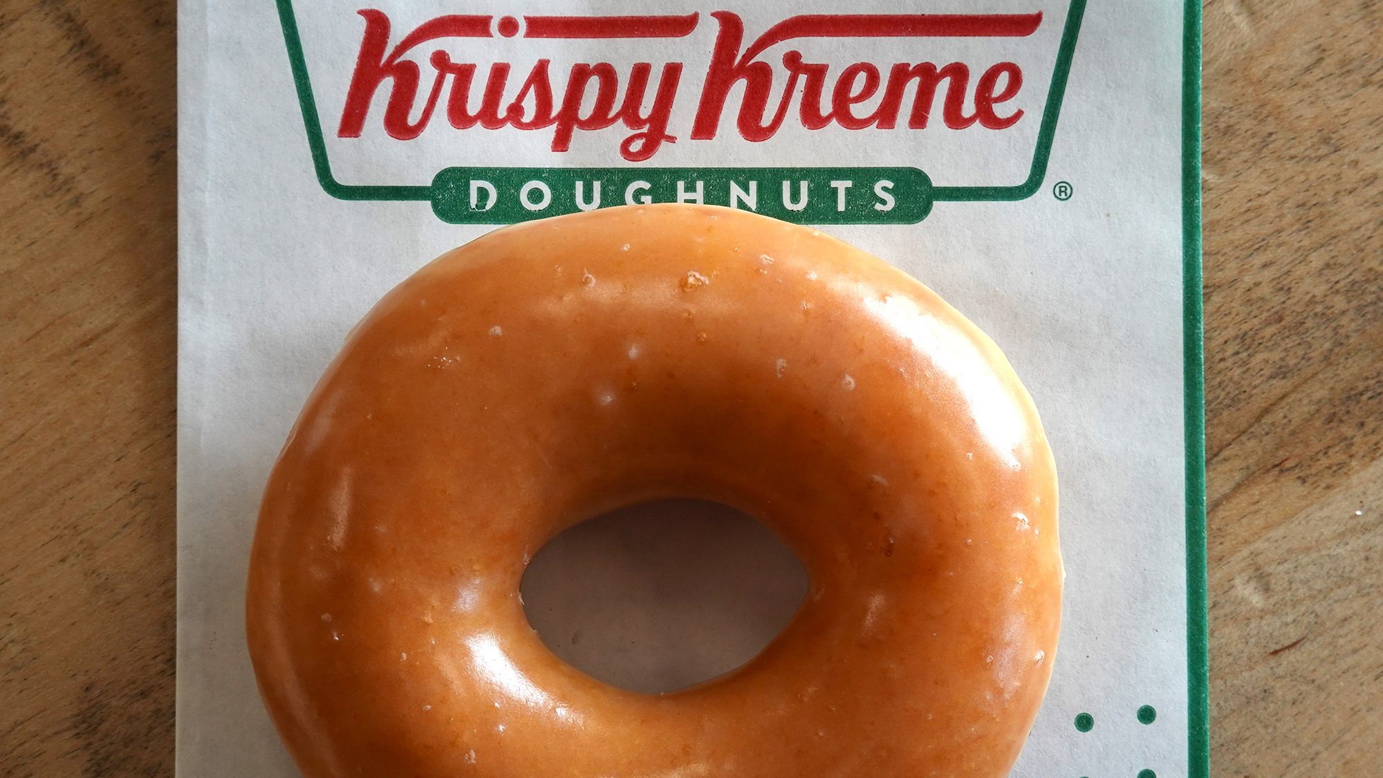 DALY CITY, CALIFORNIA - MAY 12: In this photo illustration, a Krispy Kreme glazed doughnut is shown...