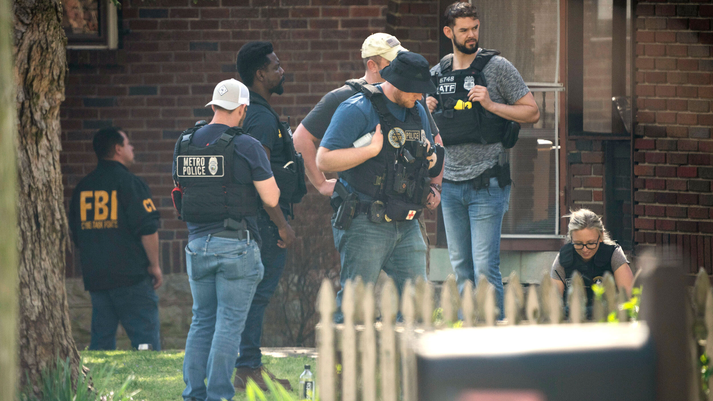 Investigators found a suicide note when they executed a search warrant at the home of the shooter w...