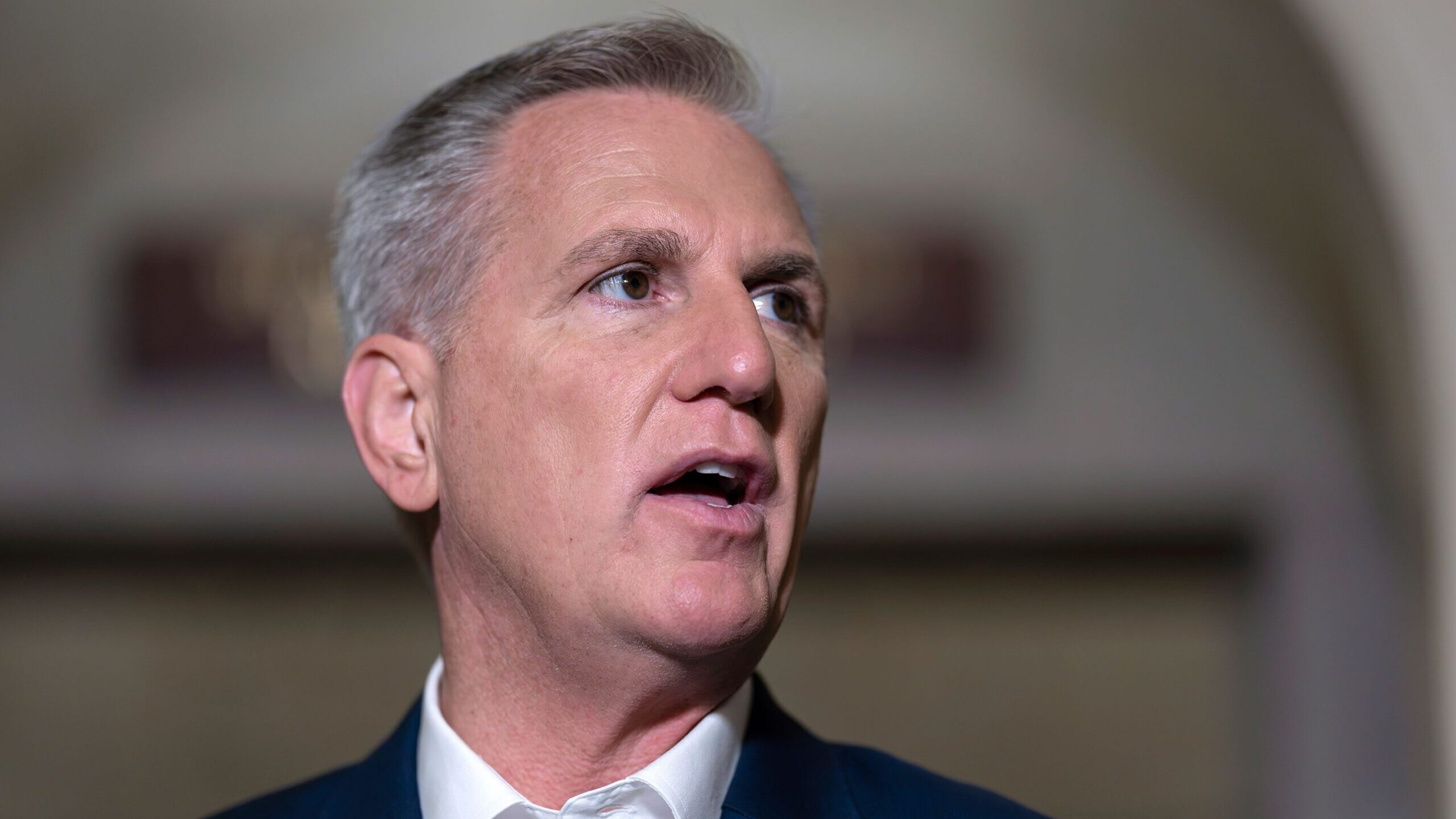 House Speaker Kevin McCarthy talks to reporters about the debt limit at the Capitol in Washington, ...