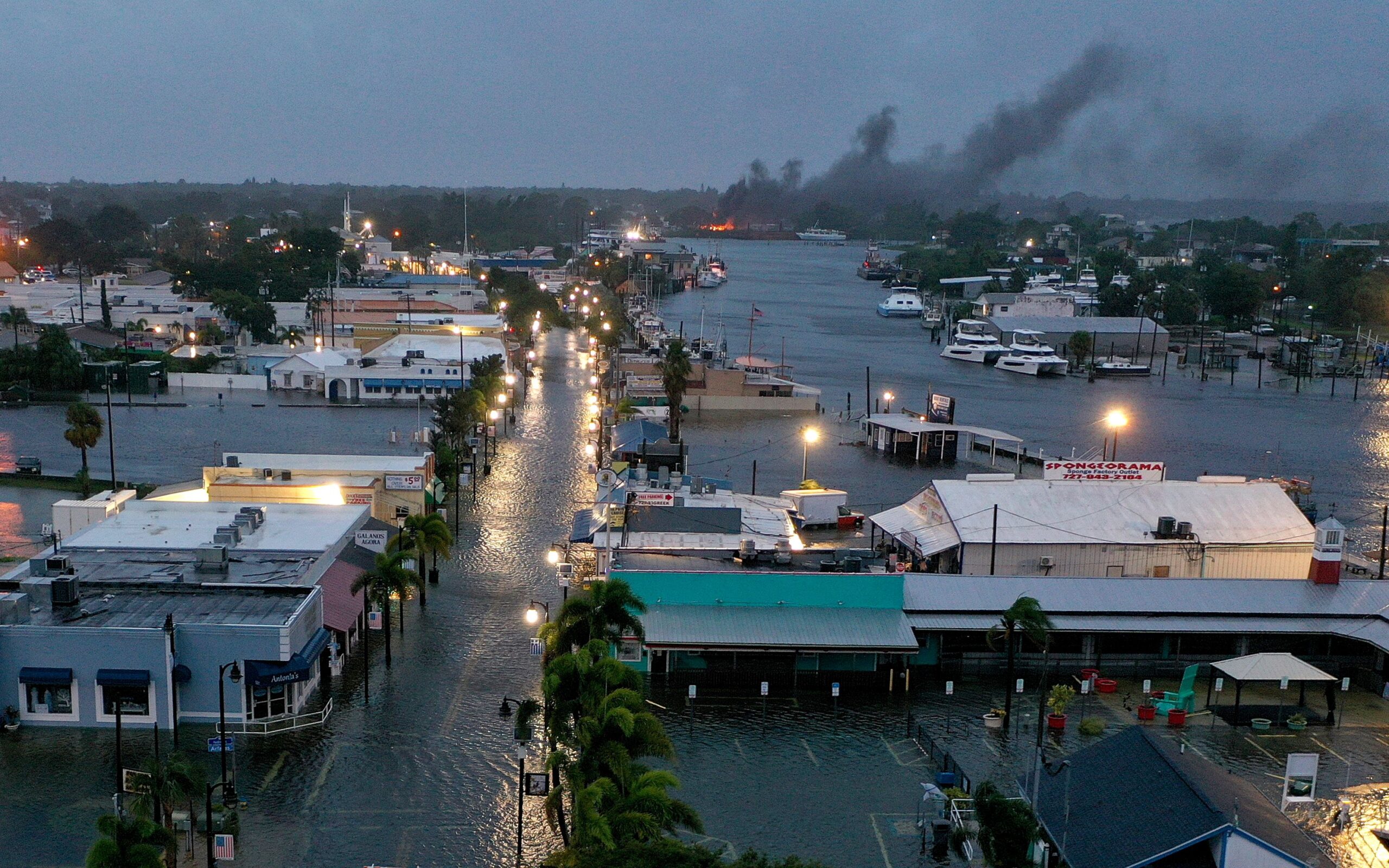 Floodwater innundates downtown Tarpon Springs, Florida, on the morning of Aug. 30. Photo credit: Jo...