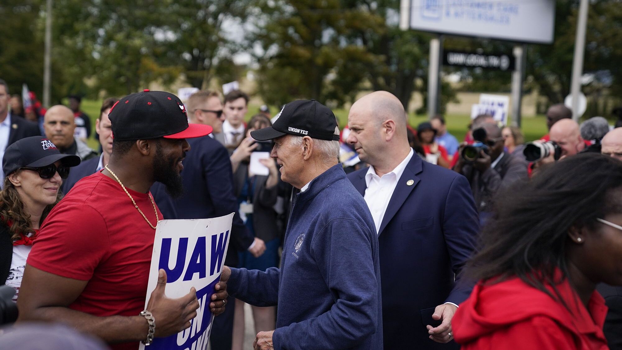 President Joe Biden greets striking United Auto Workers on the picket line, in Van Buren Township, ...
