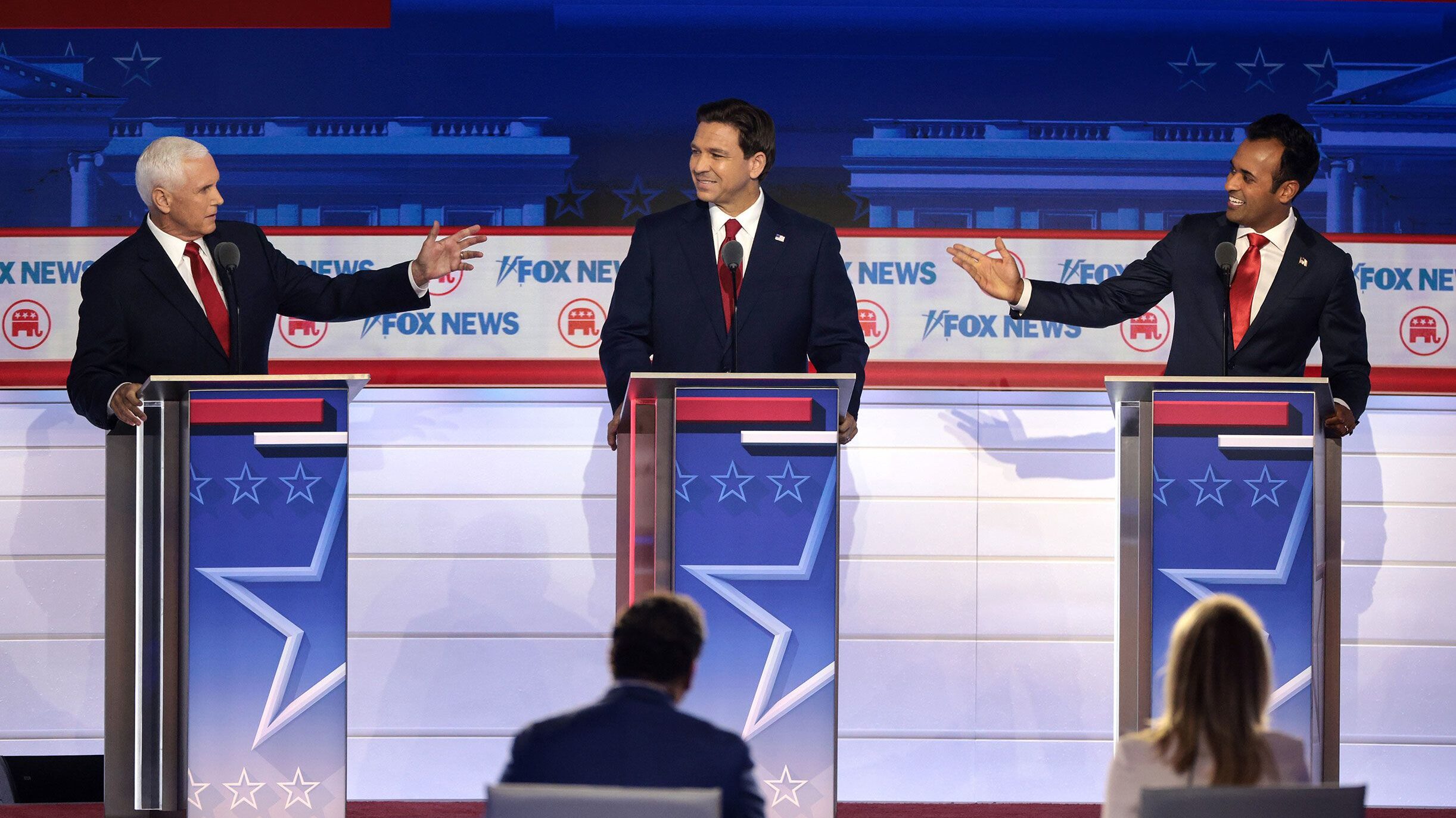 Republican presidential candidates former Vice President Mike Pence, Florida Gov. Ron DeSantis and ...