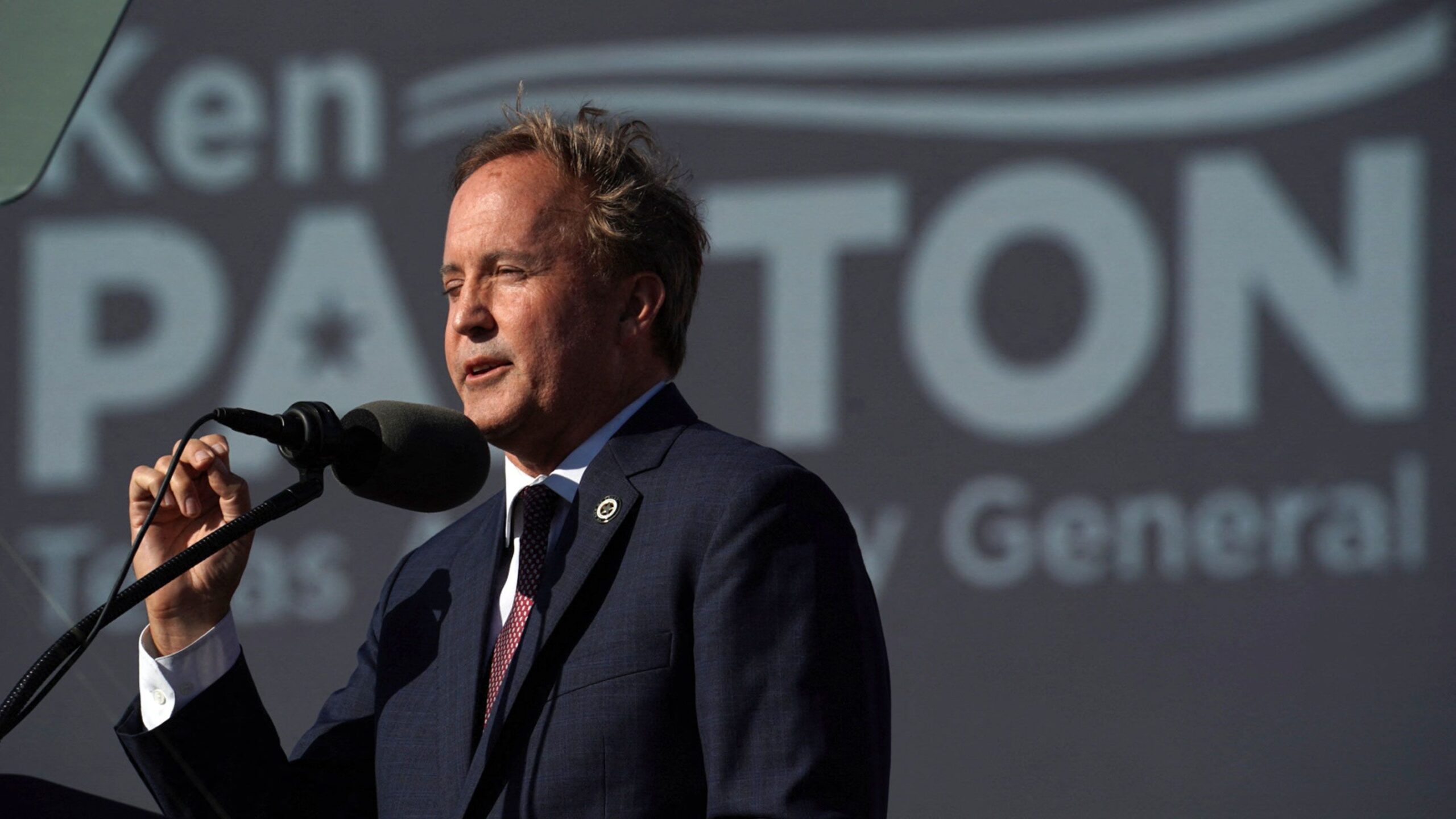 Texas Attorney General Ken Paxton speaks ahead of a rally held by former President Donald Trump, in...