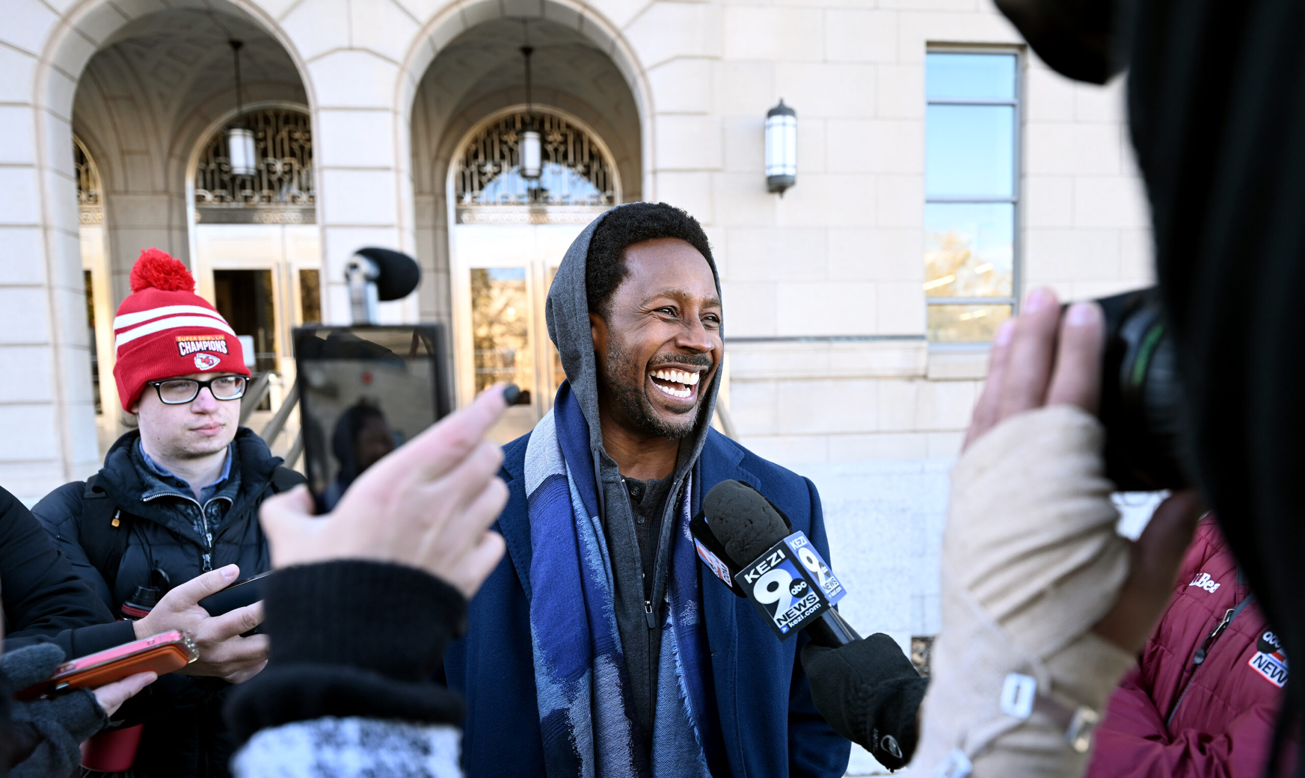 ESPN "College GameDay" analyst Desmond Howard laughs as he talks to media at the University of Utah...