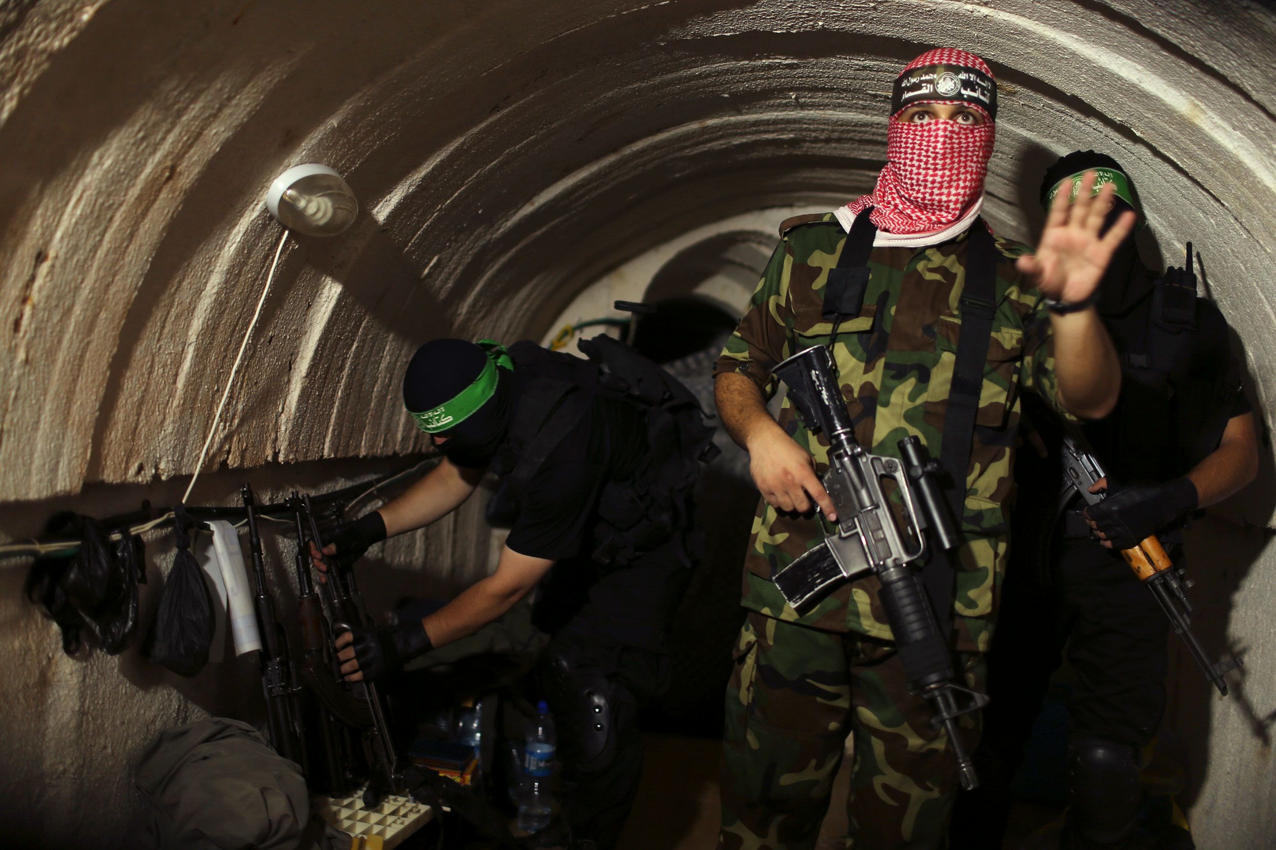 A Palestinian fighter from the Izz el-Deen al-Qassam Brigades, the armed wing of the Hamas movement...