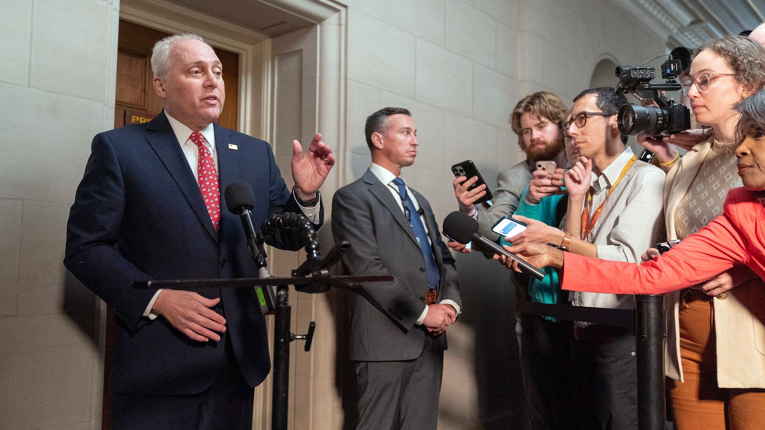 House Majority Leader Steve Scalise talks to reporters as he leaves Republicans' closed-door forum ...