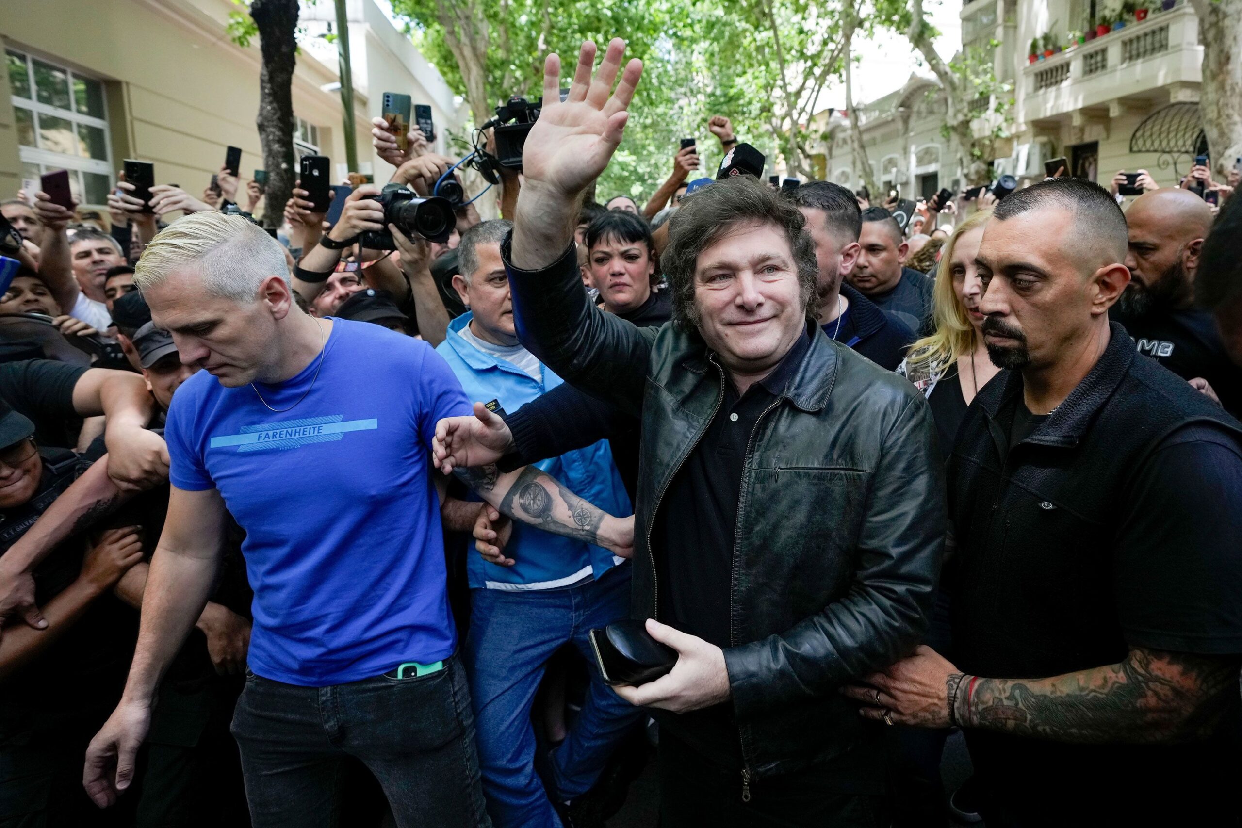 Milei, of the Liberty Advances coalition, arrives to vote in Buenos Aires, Argentina, Sunday, Nov. ...