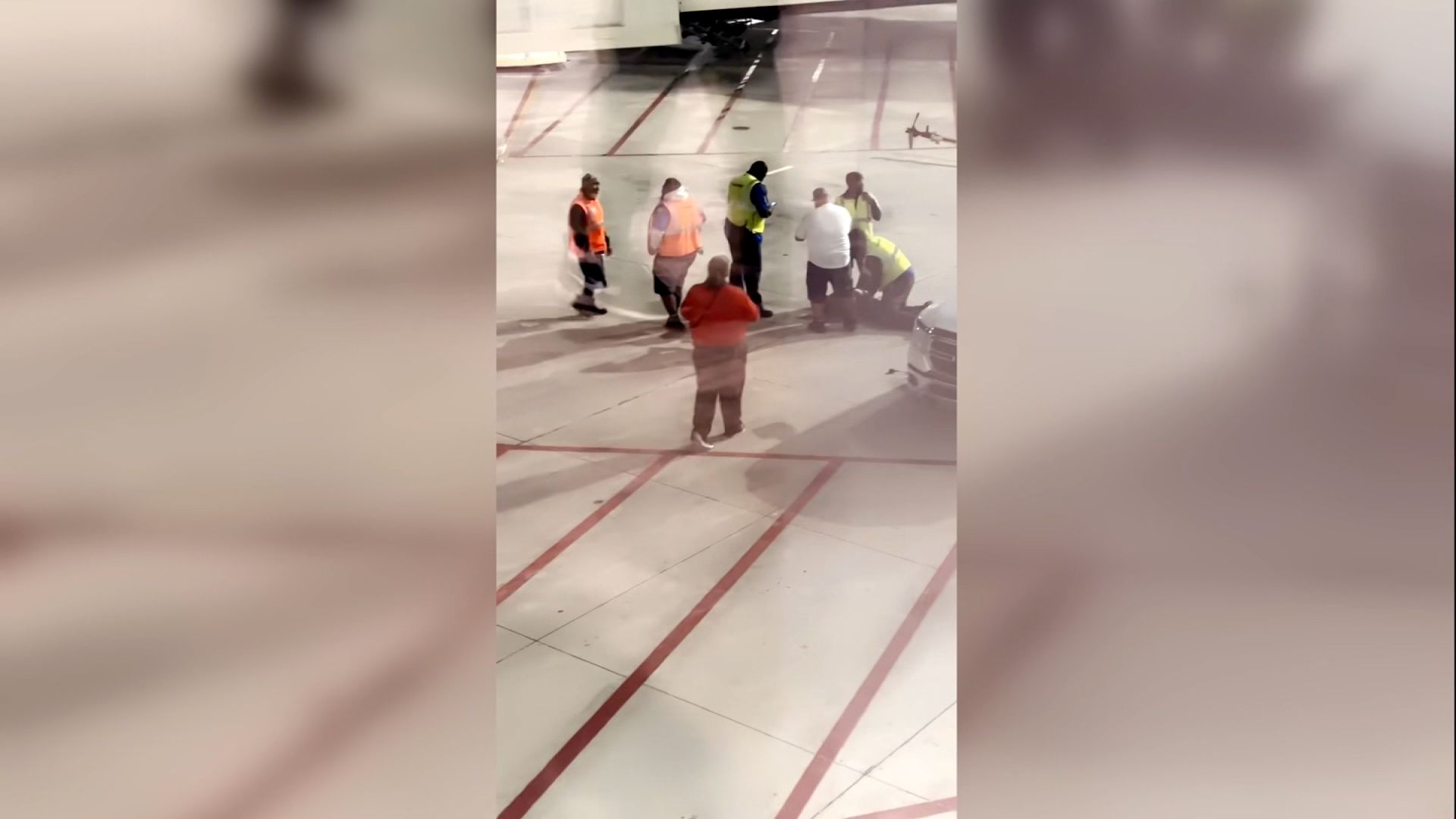 Passenger climbs on to Southwest Airlines wing...