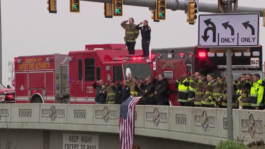 Dozens of men and women in uniforms from law enforcement agencies across Utah and Salt Lake countie...