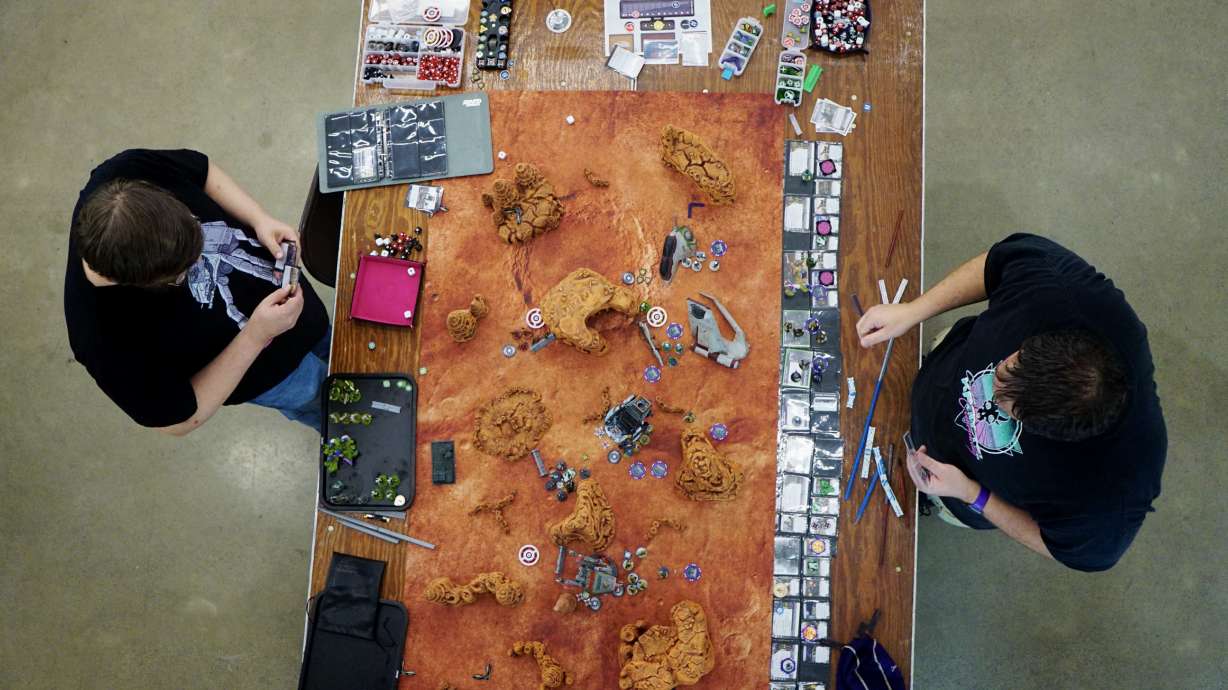 Two players compete in a wargame at the Salt Lake Open tabletop convention...