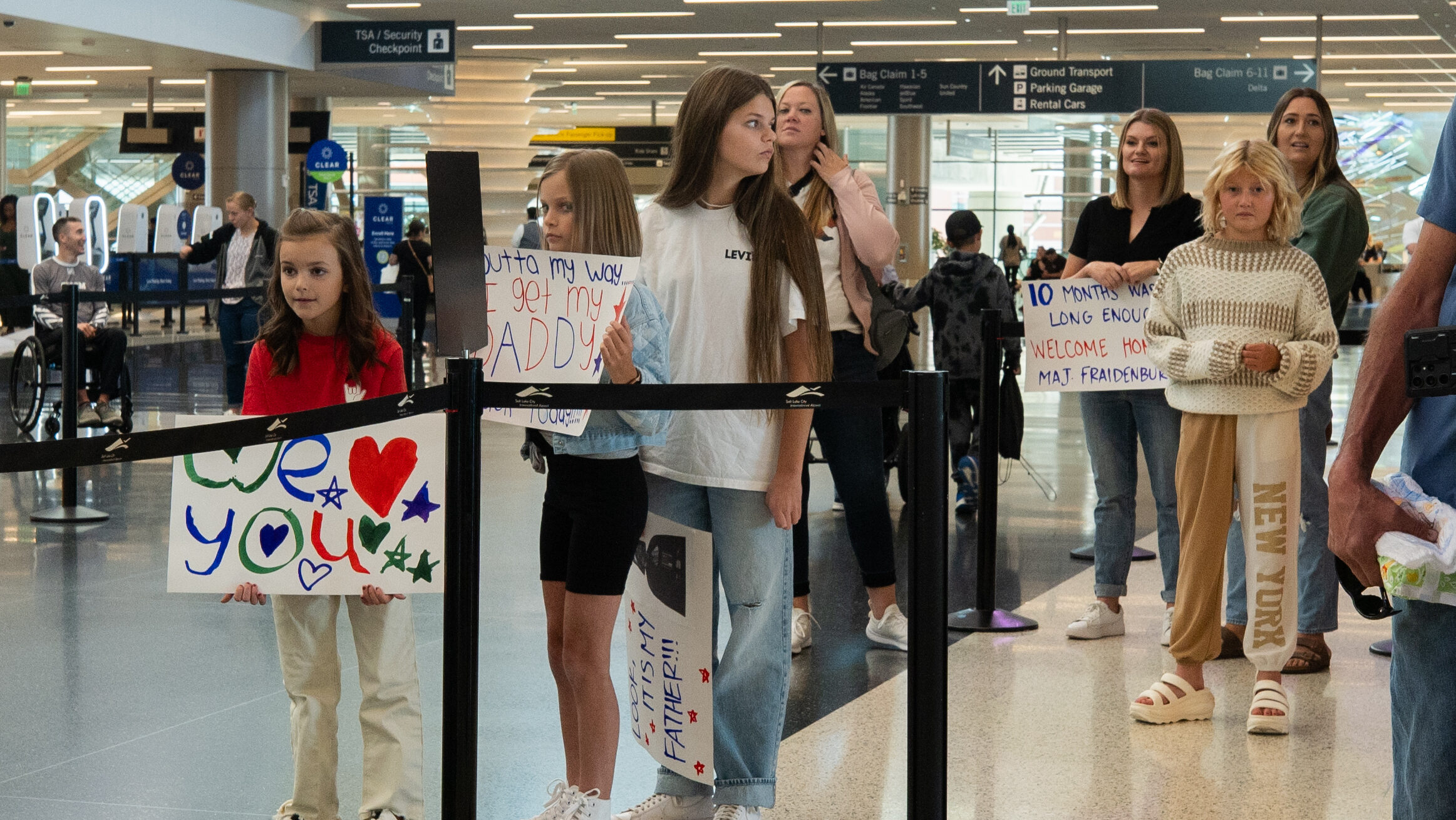Families of the ten soldiers returning home eagerly wait for them in the Salt Lake City Internation...