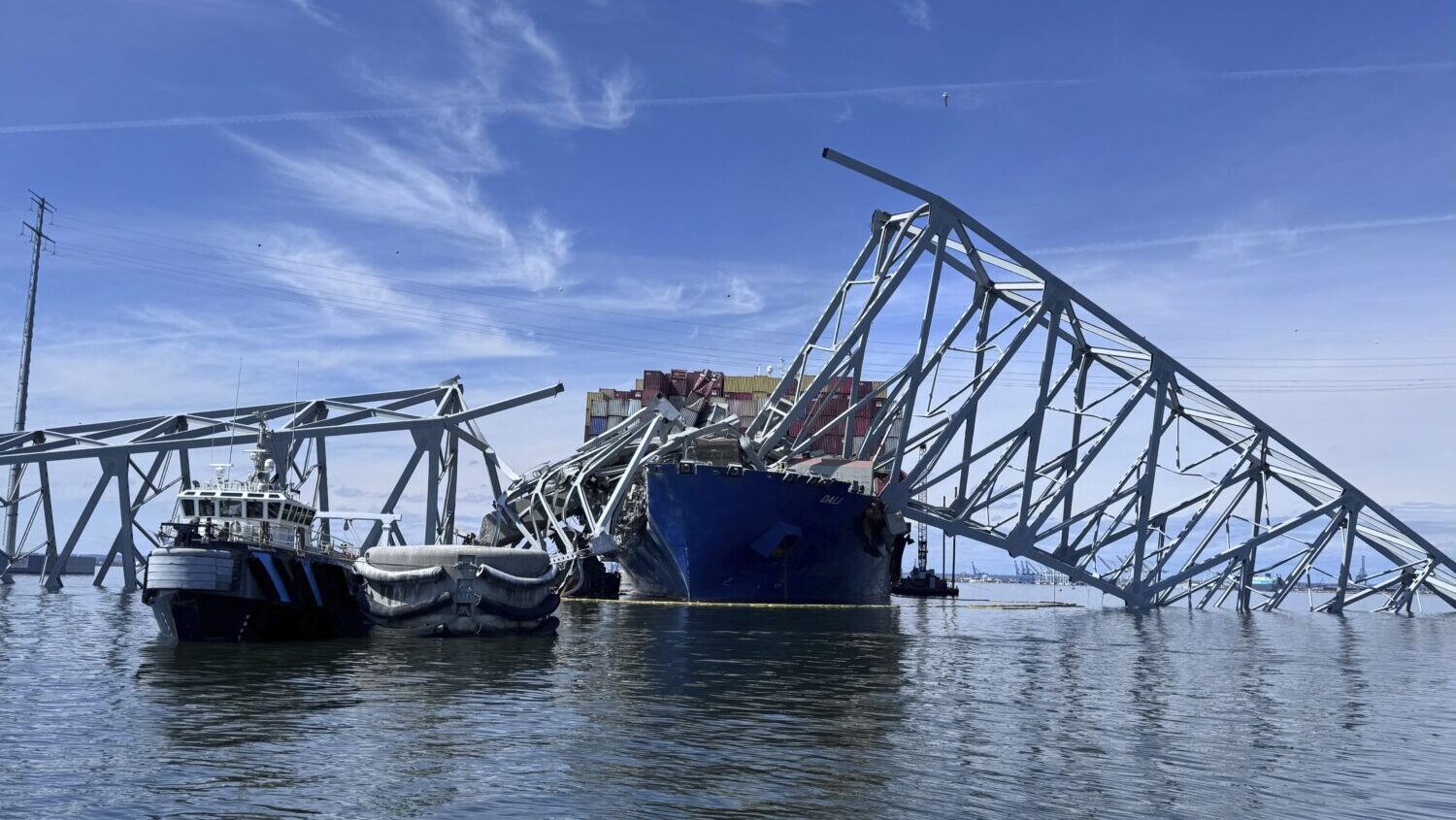 FILE - The fallen Francis Scott Key Bridge in Baltimore is pictured March 31, 2024, where divers as...