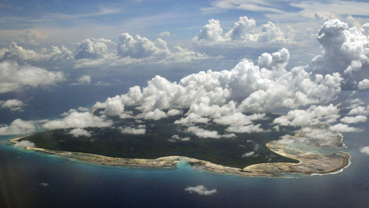 FILE: Clouds hang over the North Sentinel Island, in India's southeastern Andaman and Nicobar Islan...