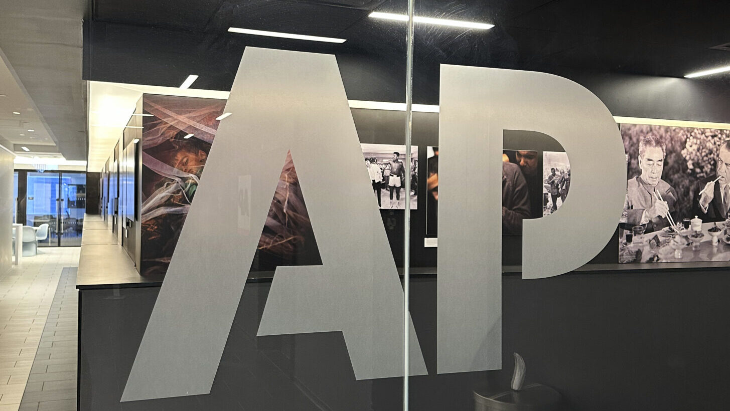 The Associated Press logo is displayed at the news organization's world headquarters in New York on...