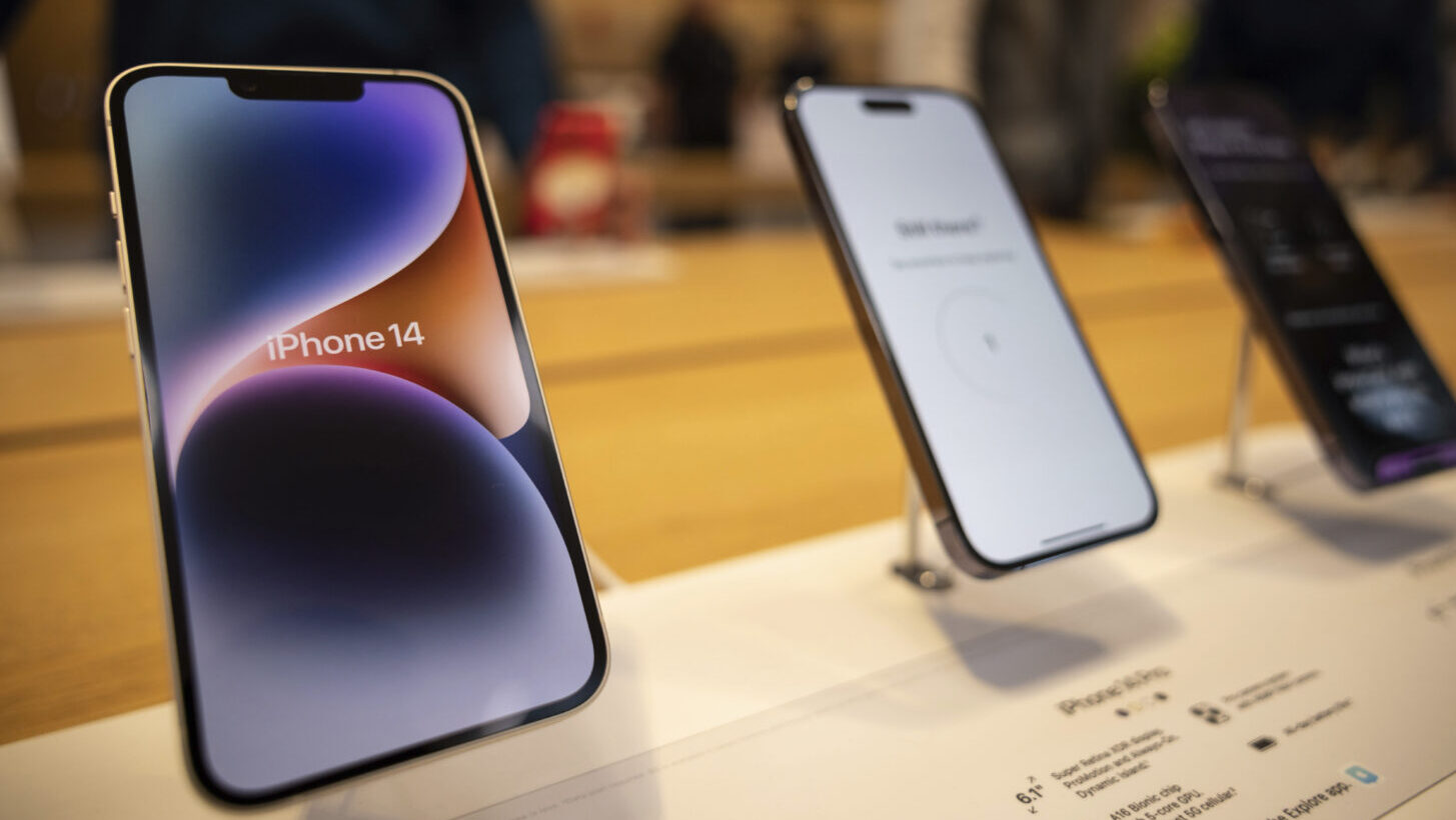 FILE - The iPhone 14, iPhone 14 Pro and iPhone 14 Pro Max are displayed at the Apple Fifth Avenue s...