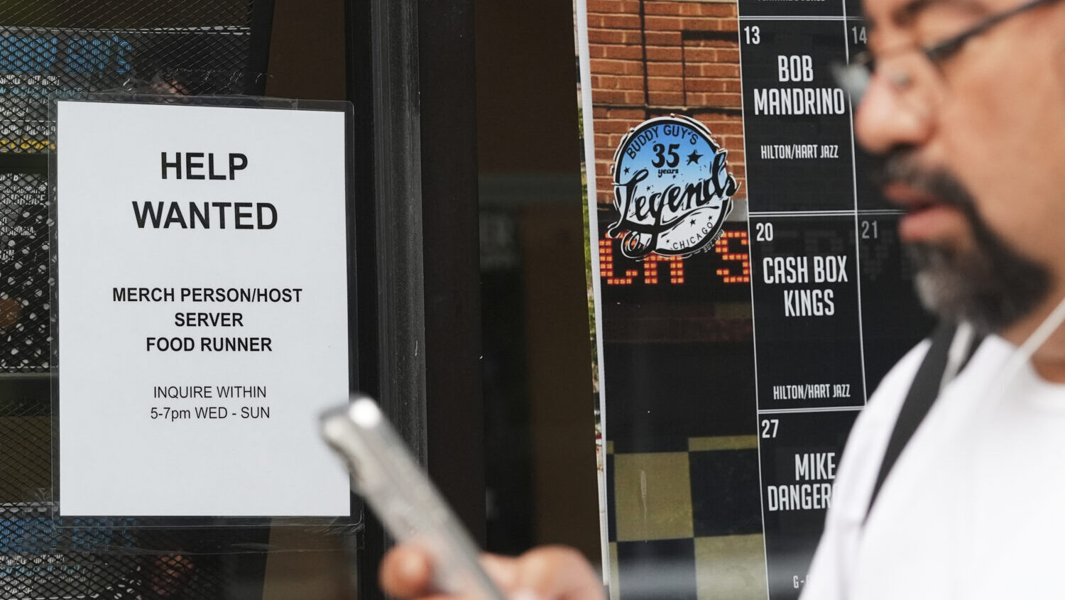 Help wanted sign is displayed at a live music and blues club in Chicago, Thursday, July 24, 2025. U...