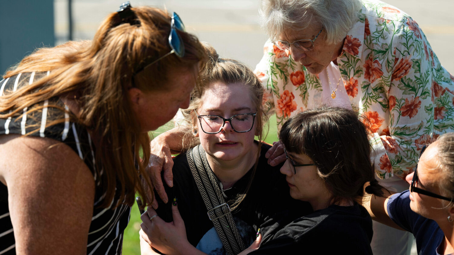 Joanne Green of Fenton, 75, top right, and McKenna Harrington of Davison, 25, second from right, co...