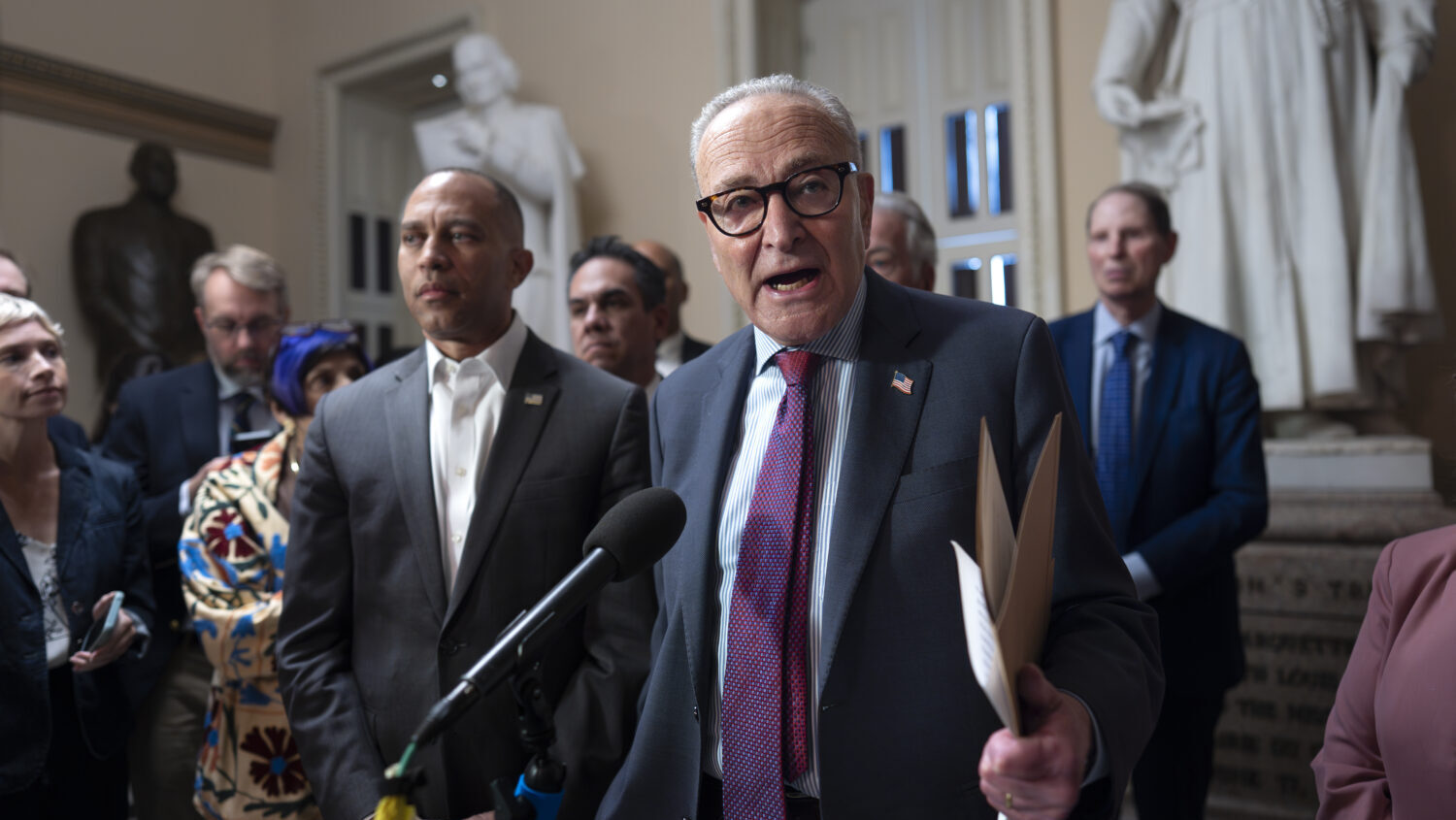 Senate Minority Leader Chuck Schumer, D-N.Y., joined at left by House Minority Leader Hakeem Jeffri...