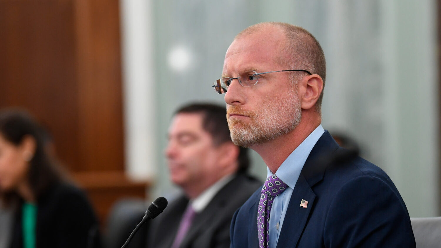 FILE - Brendan Carr listens during a Senate Commerce, Science, and Transportation committee hearing...