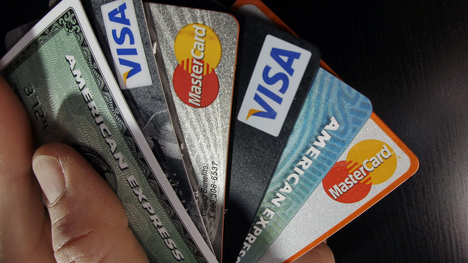 FILE - In this March 5, 2012, file photo, consumer credit cards are posed in North Andover, Mass. T...